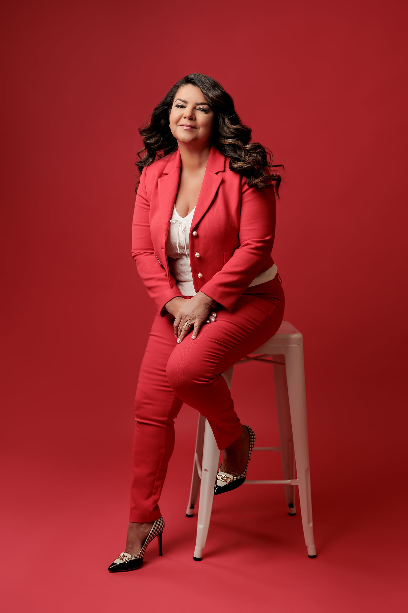 calgary-photographers-portrait-red-clothes-white-stool