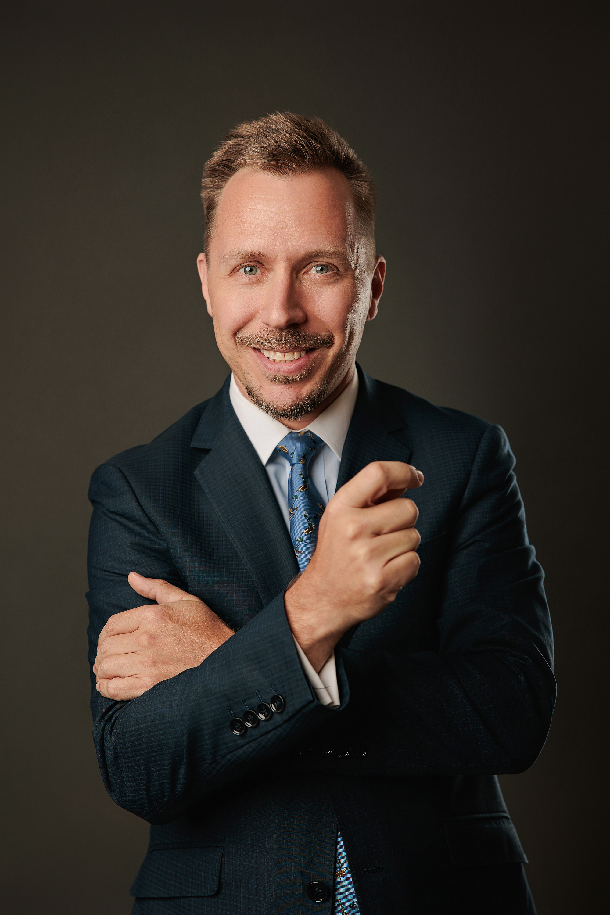 man in a suit for corporate headshots in Calgary