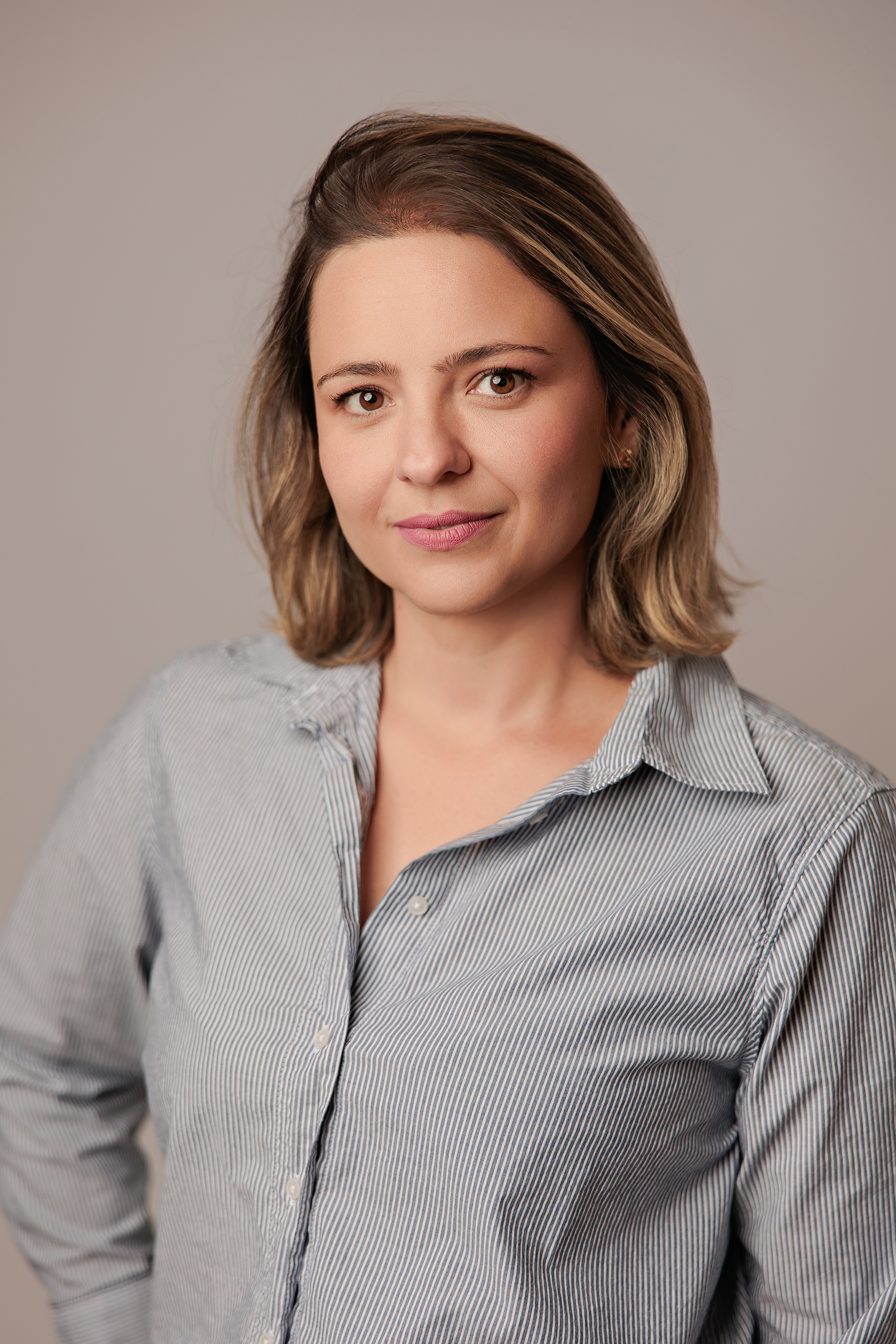 professional headshots of woman in Calgary Downtown