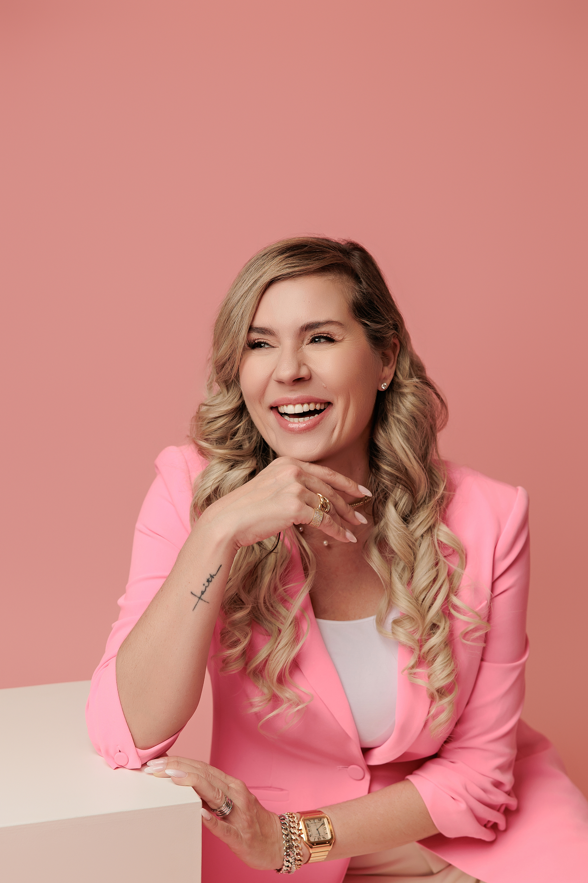 woman in pink for personal branding photos in Calgary