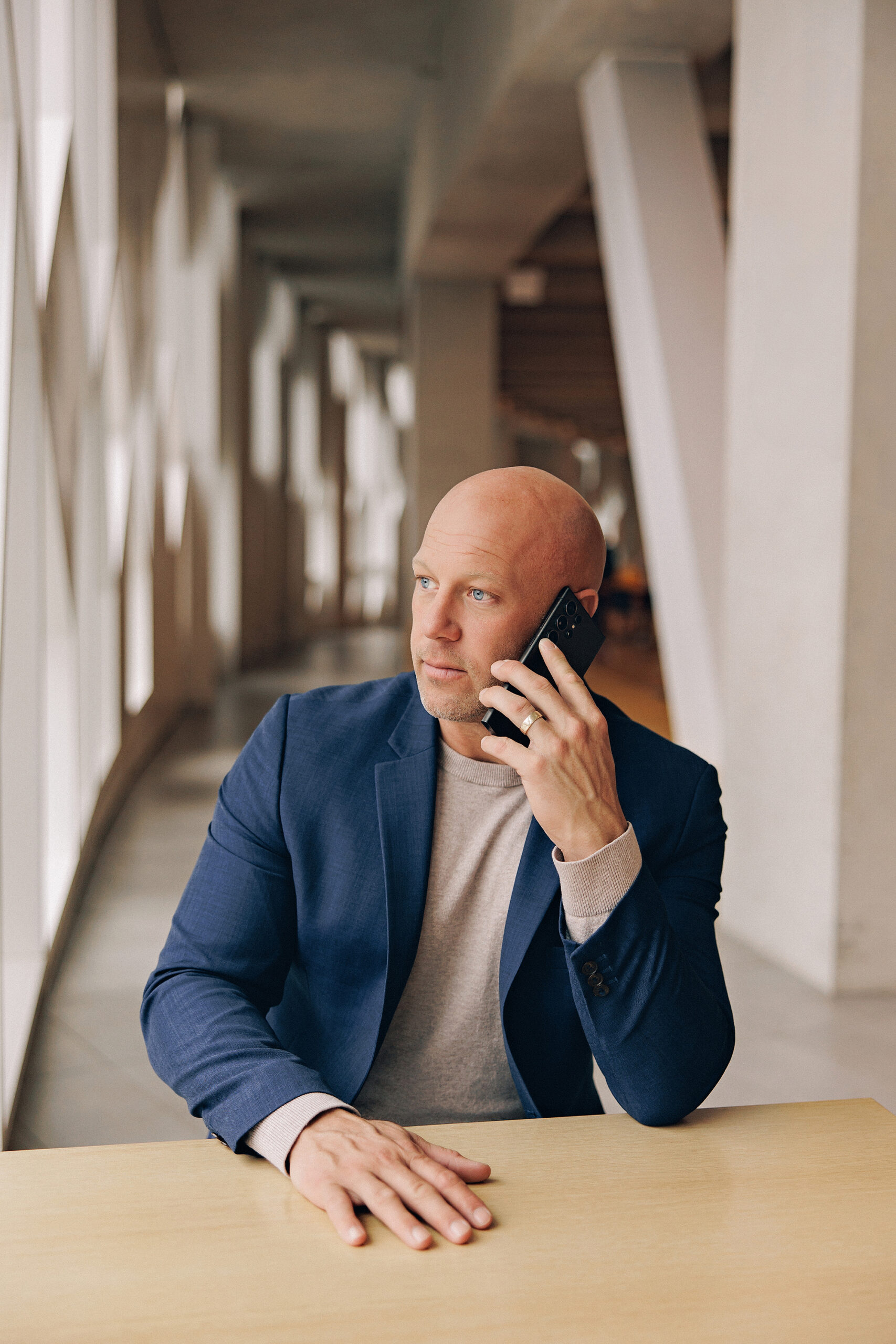 man in Calgary speaking on the phone